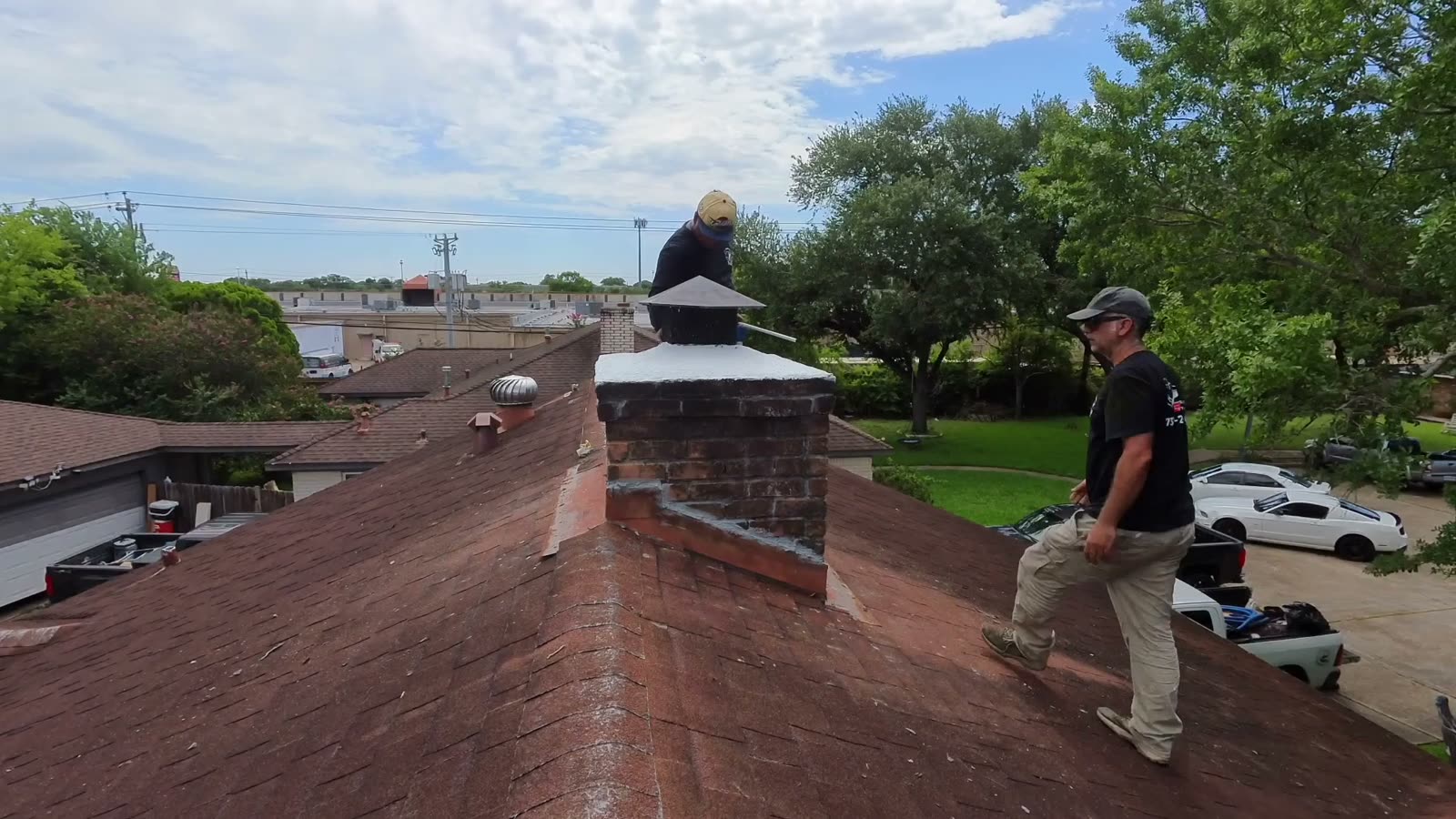 Finished chimney cap installation with newly sealed crown in Houston, TX